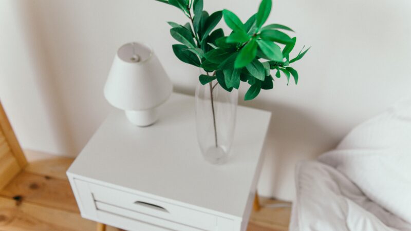 Modern white bedside table with drawer